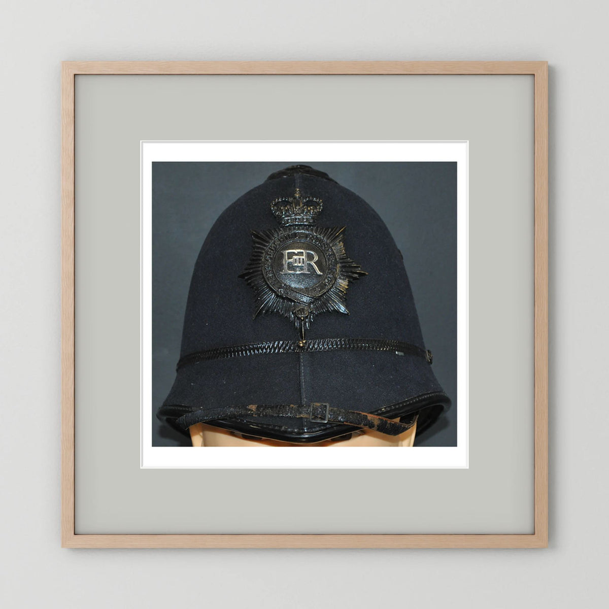 Police Helmet "Bobby." Hertfordshire Constabulary, United Kingdom. British — photograph presentation mockup
