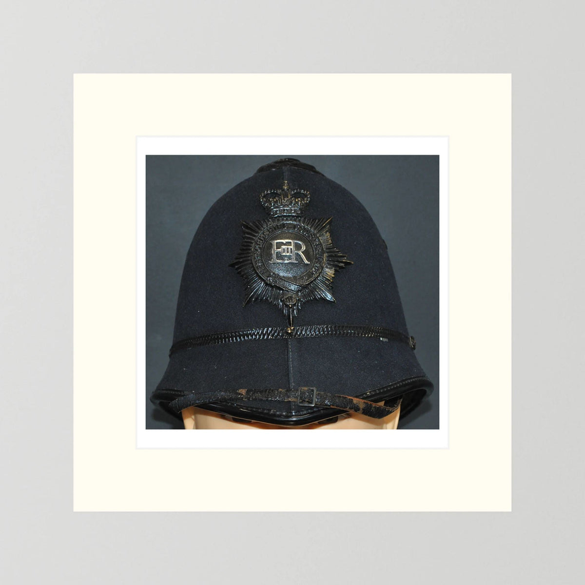 Police Helmet "Bobby." Hertfordshire Constabulary, United Kingdom. British — photograph presentation mockup