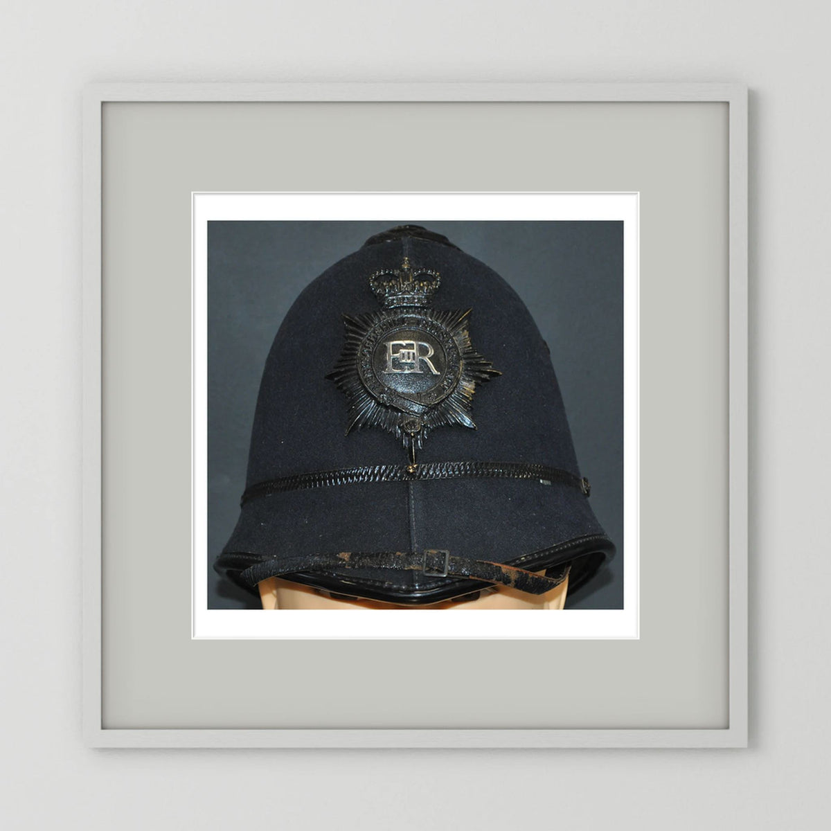Police Helmet "Bobby." Hertfordshire Constabulary, United Kingdom. British — photograph presentation mockup