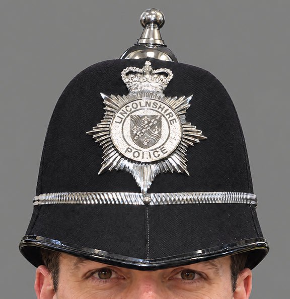 Photograph of Police Helmet "Bobby." Lincolnshire Police, United Kingdom. British