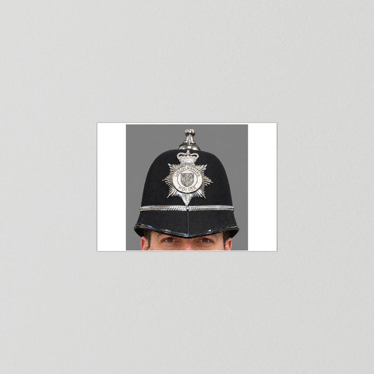 Police Helmet "Bobby." Lincolnshire Police, United Kingdom. British — photograph presentation mockup