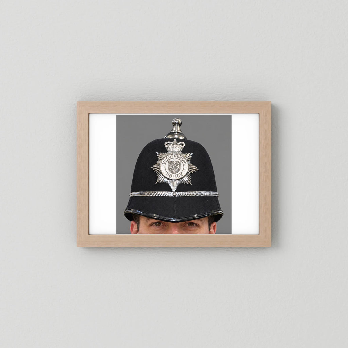 Police Helmet "Bobby." Lincolnshire Police, United Kingdom. British — photograph presentation mockup
