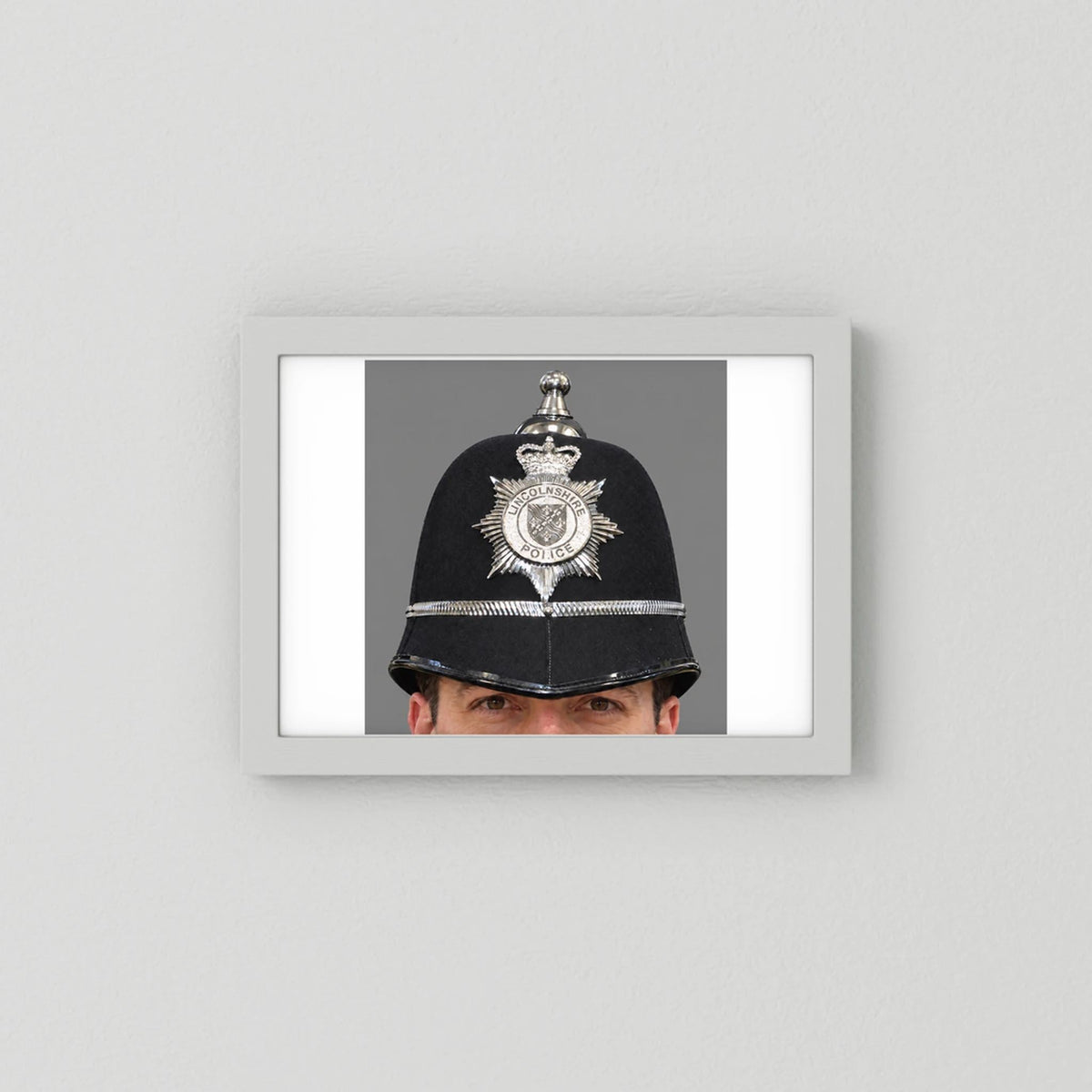 Police Helmet "Bobby." Lincolnshire Police, United Kingdom. British — photograph presentation mockup