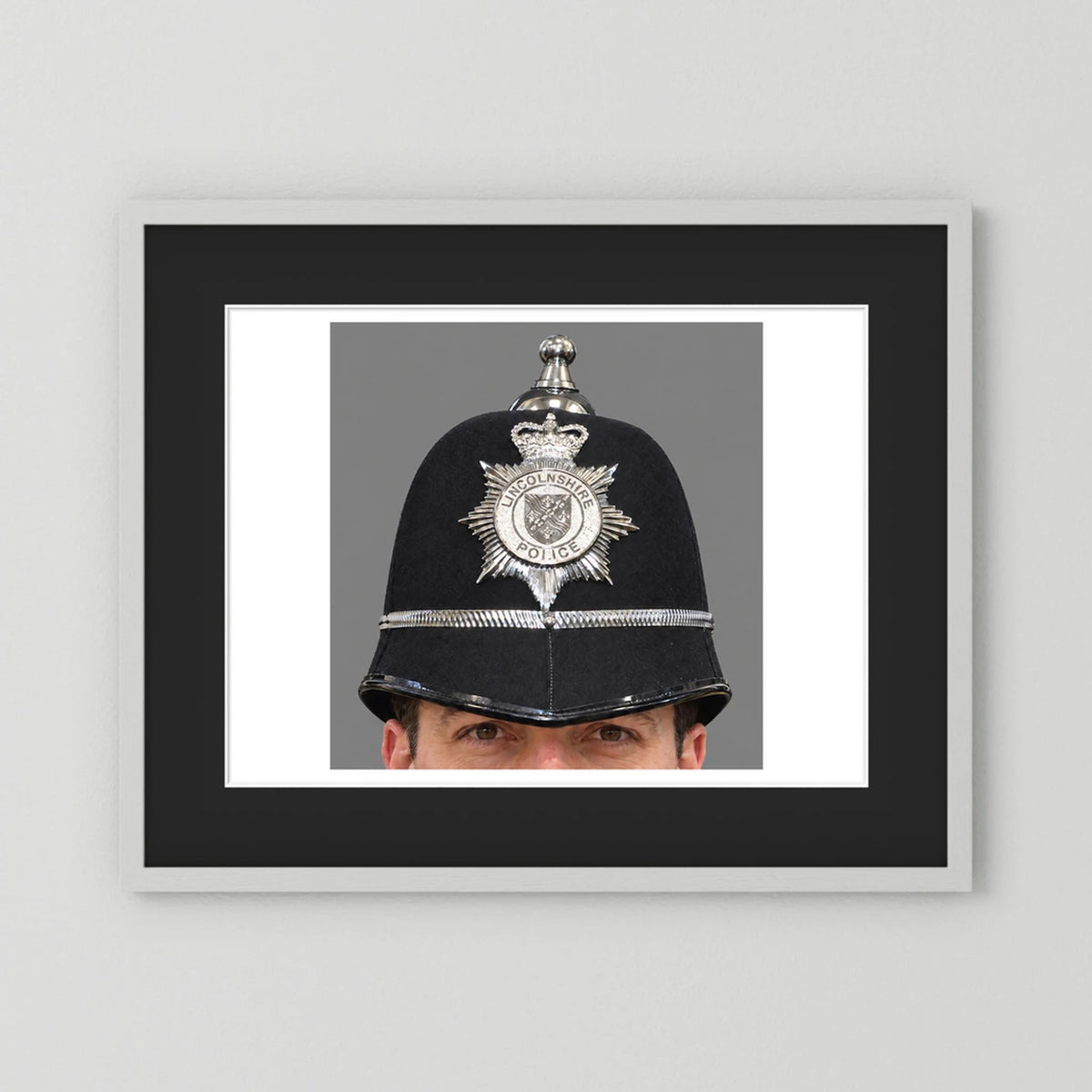 Police Helmet "Bobby." Lincolnshire Police, United Kingdom. British — photograph presentation mockup