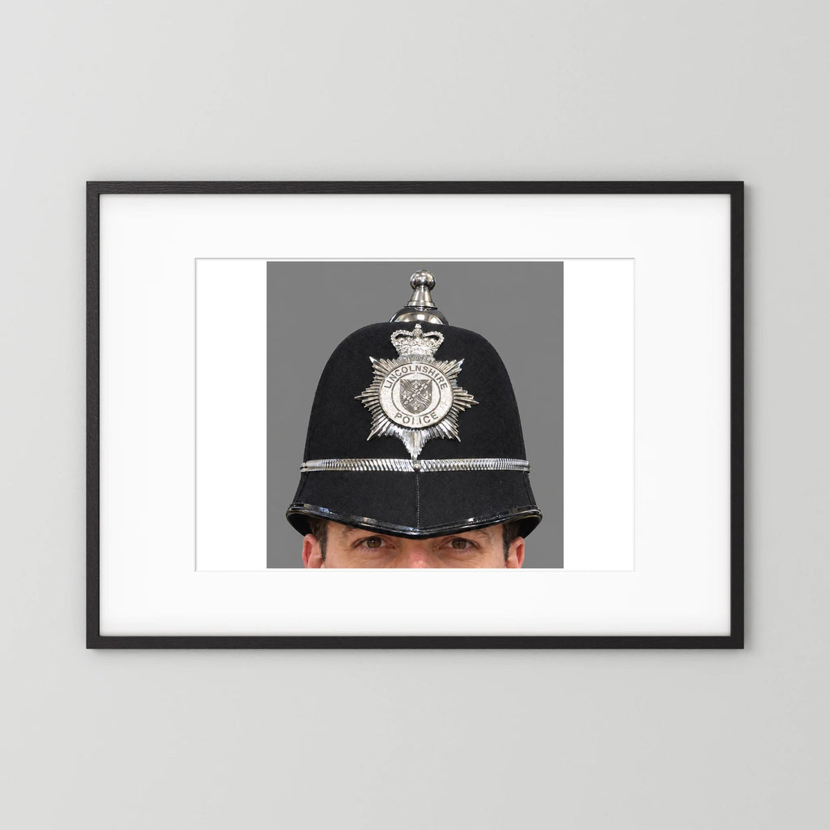 Police Helmet "Bobby." Lincolnshire Police, United Kingdom. British — photograph presentation mockup