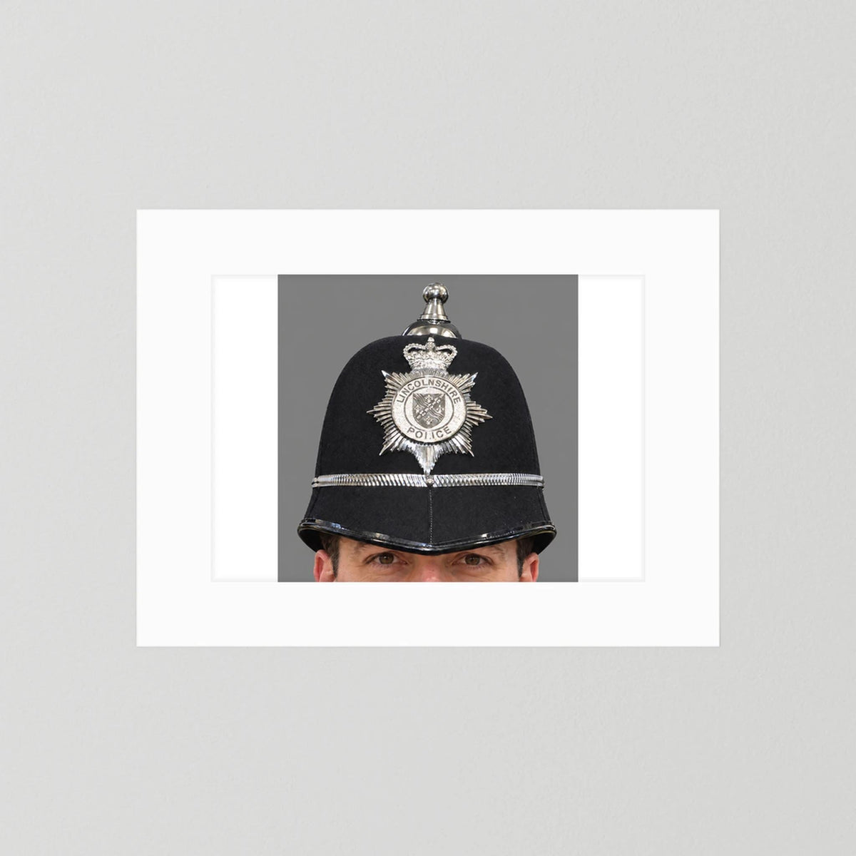 Police Helmet "Bobby." Lincolnshire Police, United Kingdom. British — photograph presentation mockup