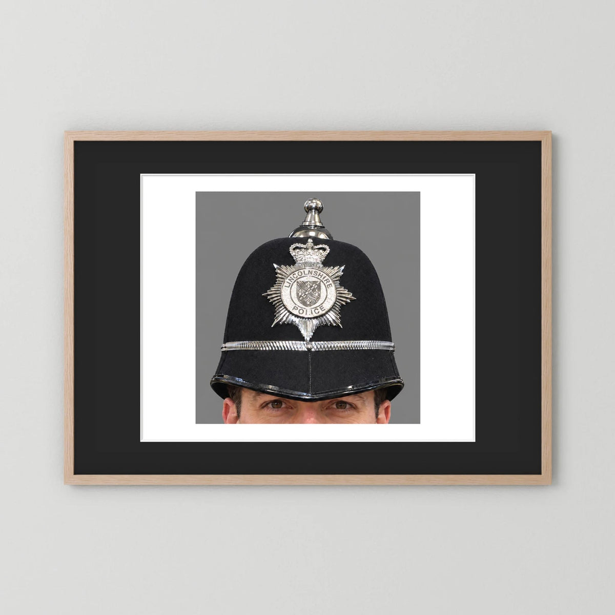 Police Helmet "Bobby." Lincolnshire Police, United Kingdom. British — photograph presentation mockup