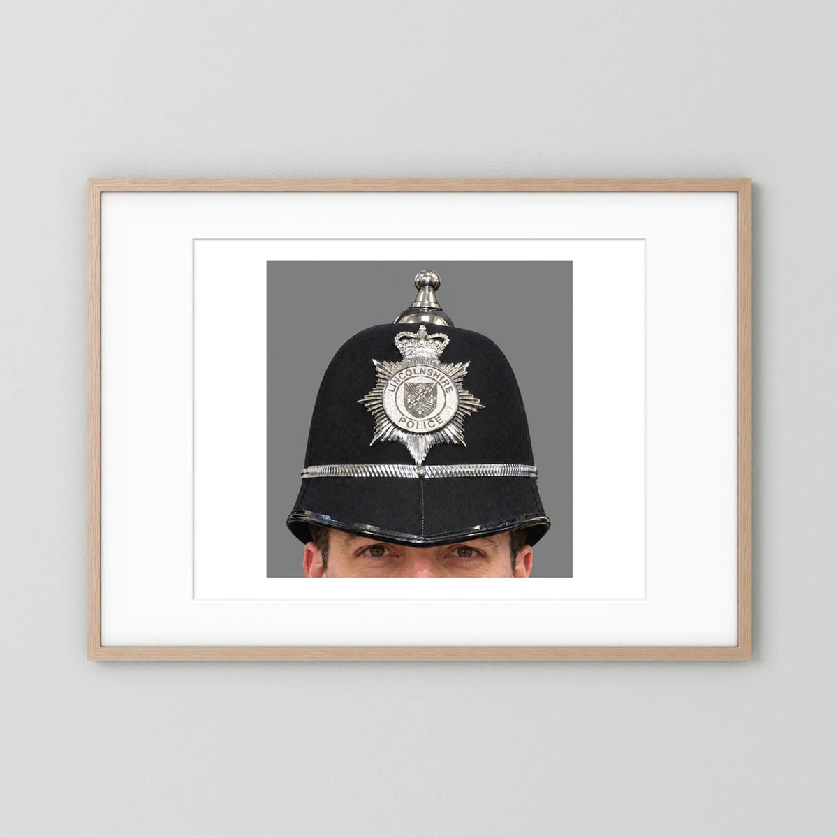 Police Helmet "Bobby." Lincolnshire Police, United Kingdom. British — photograph presentation mockup