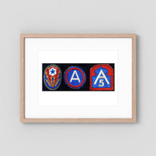 Shoulder Sleeve Insignia, US Army WW2 — composite displayed in a black wood frame mockup