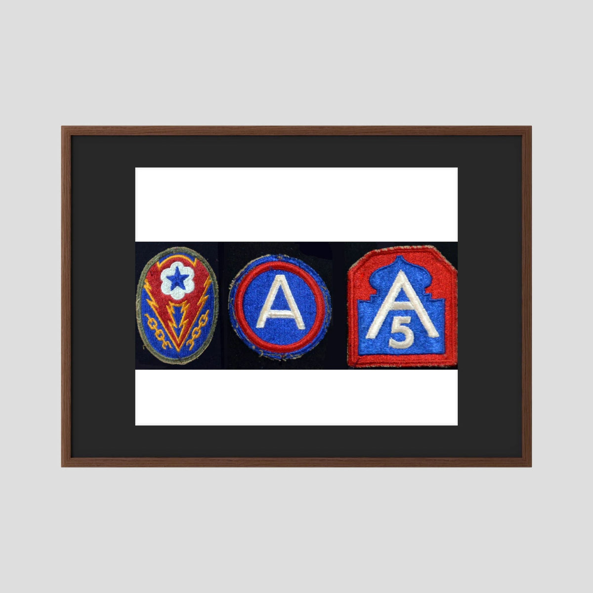 Shoulder Sleeve Insignia, US Army WW2 — composite displayed in a black wood frame mockup