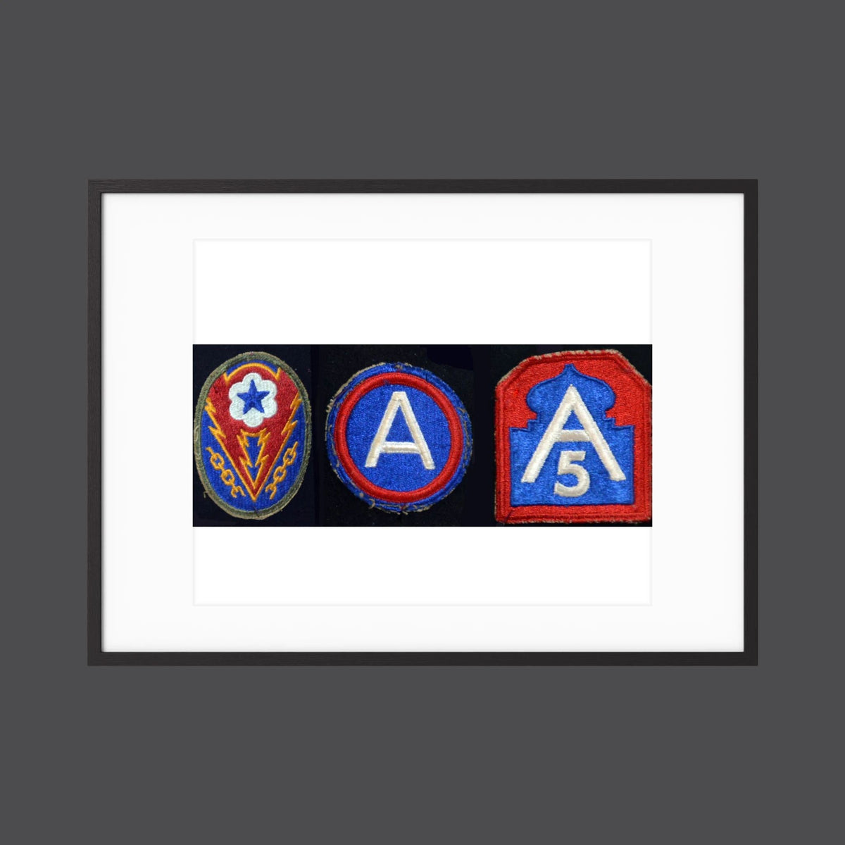 Shoulder Sleeve Insignia, US Army WW2 — composite displayed in a black wood frame mockup