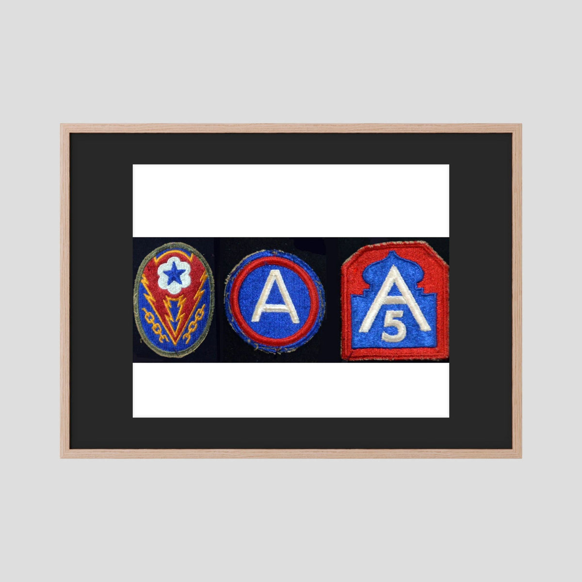 Shoulder Sleeve Insignia, US Army WW2 — composite displayed in a black wood frame mockup