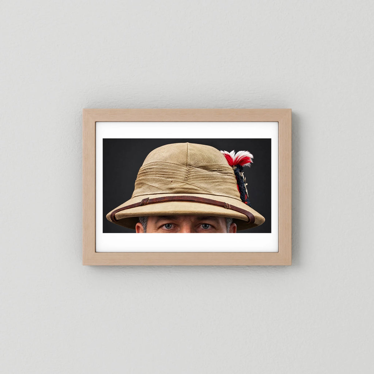 Photograph of Sun Helmet, Bombay Bowler, Seaforth Highlanders. 1942, with Tartan, Regimental Insignia & Hackle