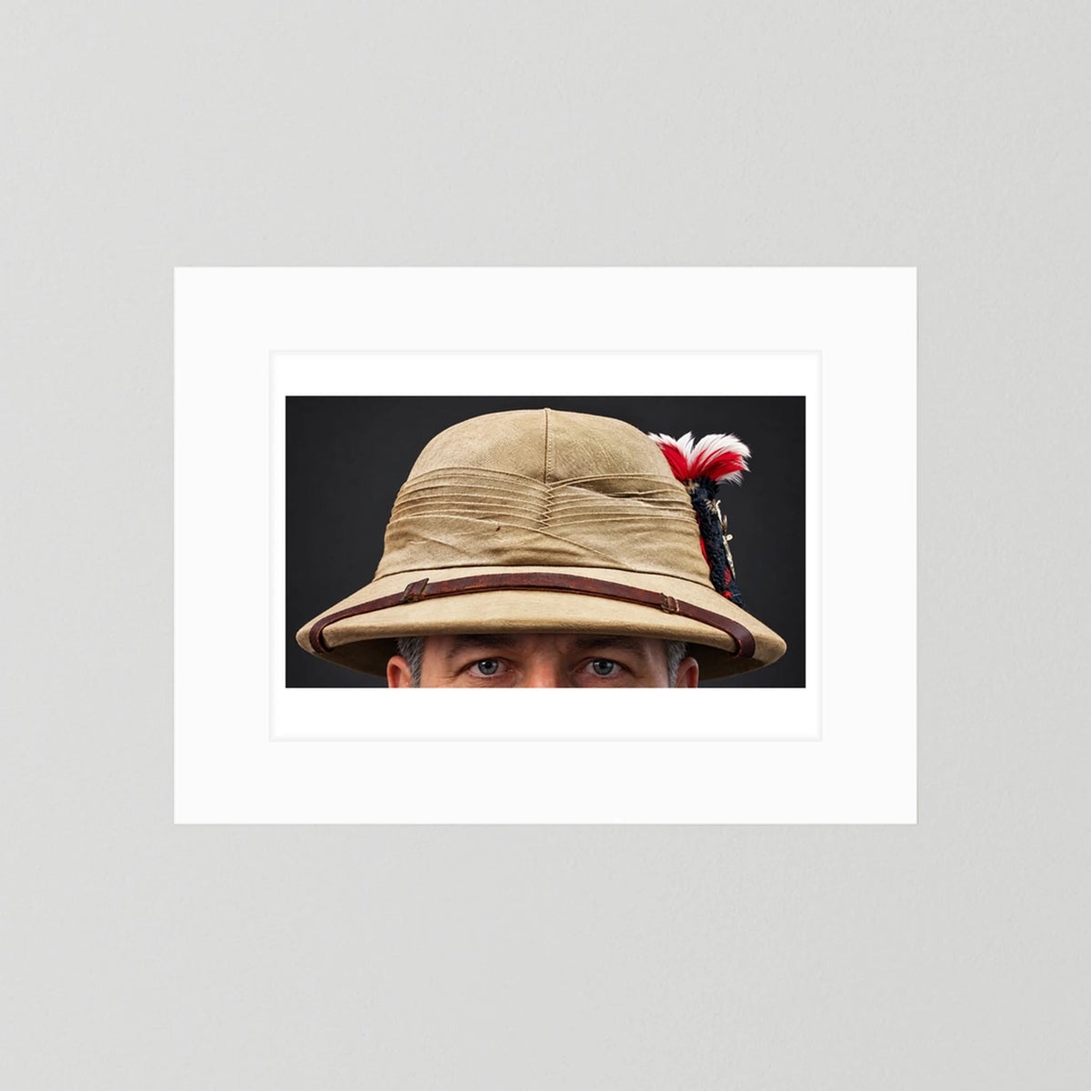 Photograph of Sun Helmet, Bombay Bowler, Seaforth Highlanders. 1942, with Tartan, Regimental Insignia & Hackle