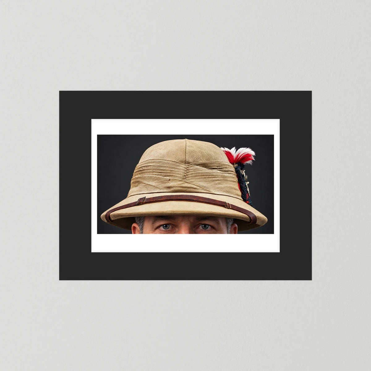 Photograph of Sun Helmet, Bombay Bowler, Seaforth Highlanders. 1942, with Tartan, Regimental Insignia & Hackle