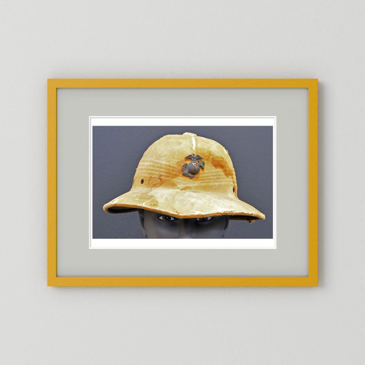 Sun Helmet, USMC, World War Two — photograph displayed in a black wood frame mockup
