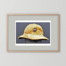 Sun Helmet, USMC, World War Two — photograph displayed in a black wood frame mockup