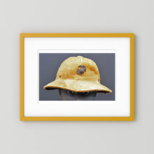Sun Helmet, USMC, World War Two — photograph displayed in a black wood frame mockup