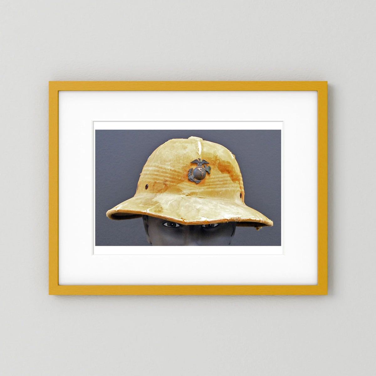 Sun Helmet, USMC, World War Two — photograph displayed in a black wood frame mockup