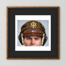 US Army Air Force WW2 Crusher Caps with headphones. Temperate Cover — photograph displayed in a black wood frame mockup