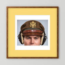 US Army Air Force WW2 Crusher Caps with headphones. Temperate Cover — photograph displayed in a black wood frame mockup