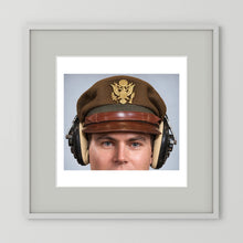 US Army Air Force WW2 Crusher Caps with headphones. Temperate Cover — photograph displayed in a black wood frame mockup