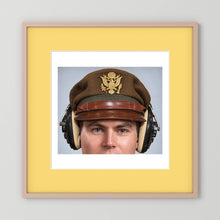 US Army Air Force WW2 Crusher Caps with headphones. Temperate Cover — photograph displayed in a black wood frame mockup