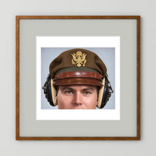 US Army Air Force WW2 Crusher Caps with headphones. Temperate Cover — photograph displayed in a black wood frame mockup