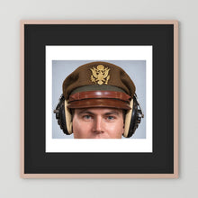 US Army Air Force WW2 Crusher Caps with headphones. Temperate Cover — photograph displayed in a black wood frame mockup