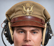 Photograph of US Army Air Force WW2 Crusher Caps with headphones. Tropical Cover