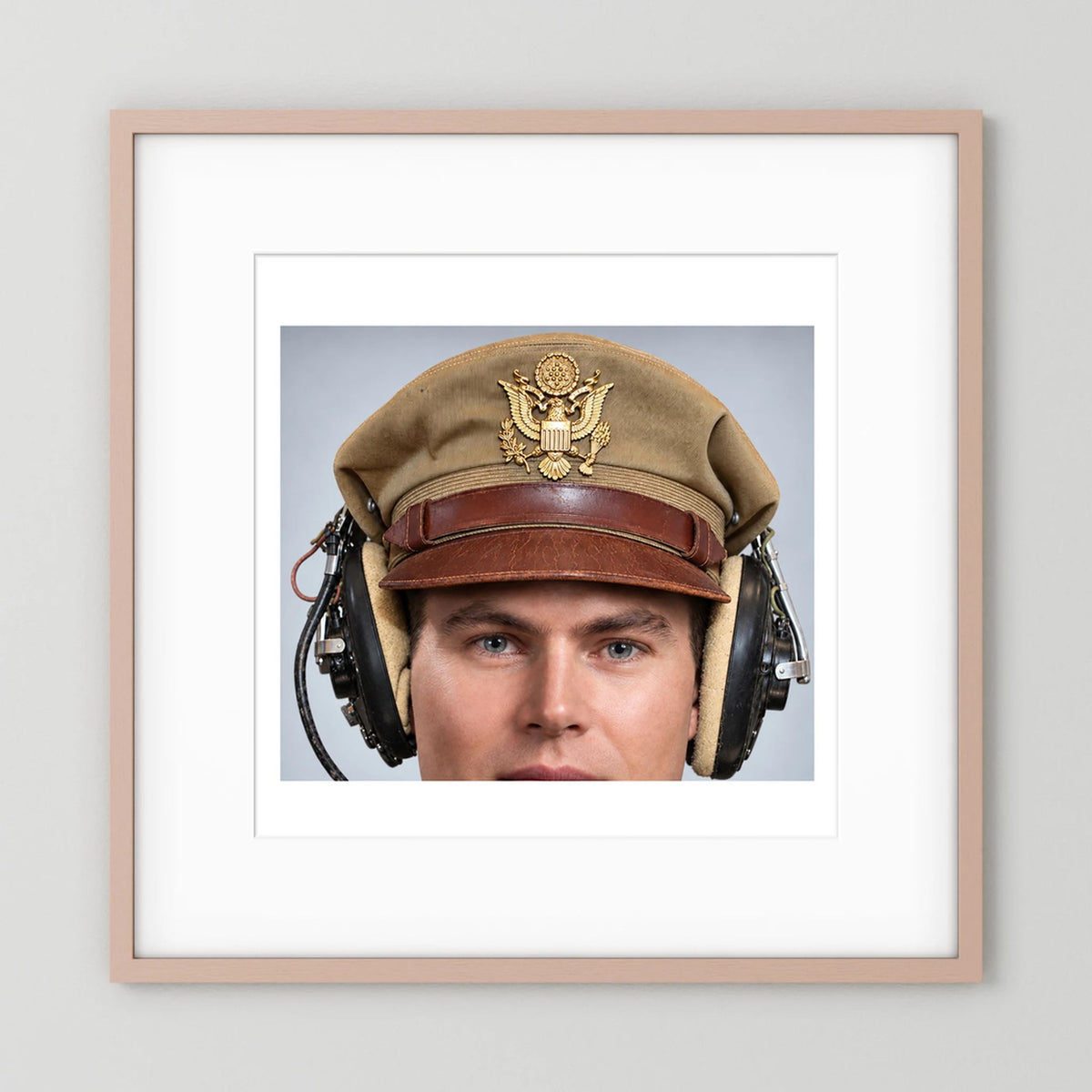 US Army Air Force WW2 Crusher Caps with headphones. Tropical Cover — photograph displayed in a black wood frame mockup
