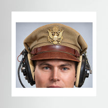 US Army Air Force WW2 Crusher Caps with headphones. Tropical Cover — photograph displayed in a black wood frame mockup