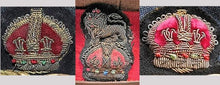 WW2 UK Bullion Cap Badges with Red Crowns. Photograph - Art goes to War